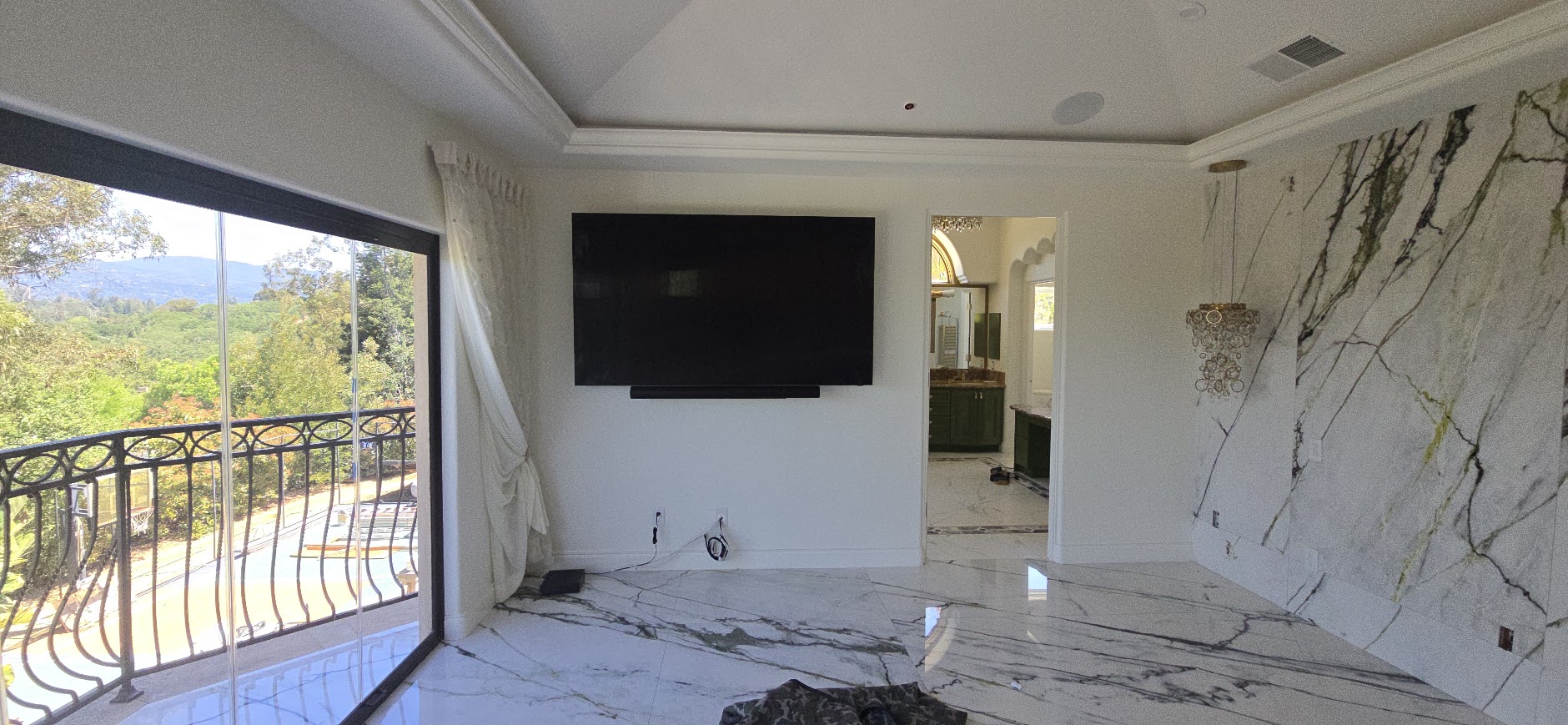 Corner-room TV installation